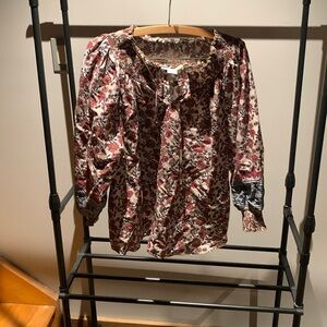Woman’s patterned pull over blouse